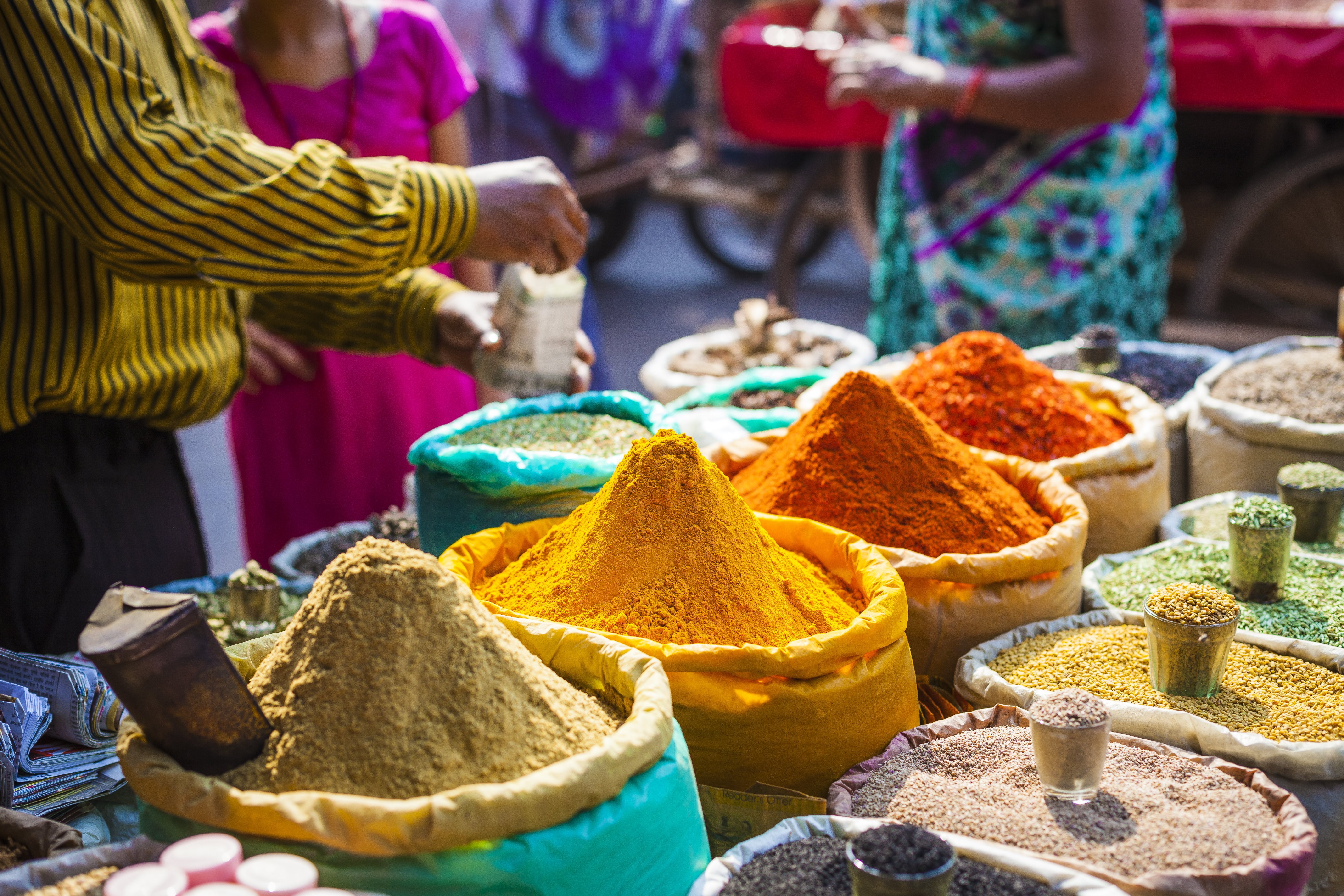 colorful pyramids of spices at market