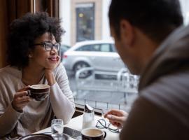 two people in cafe